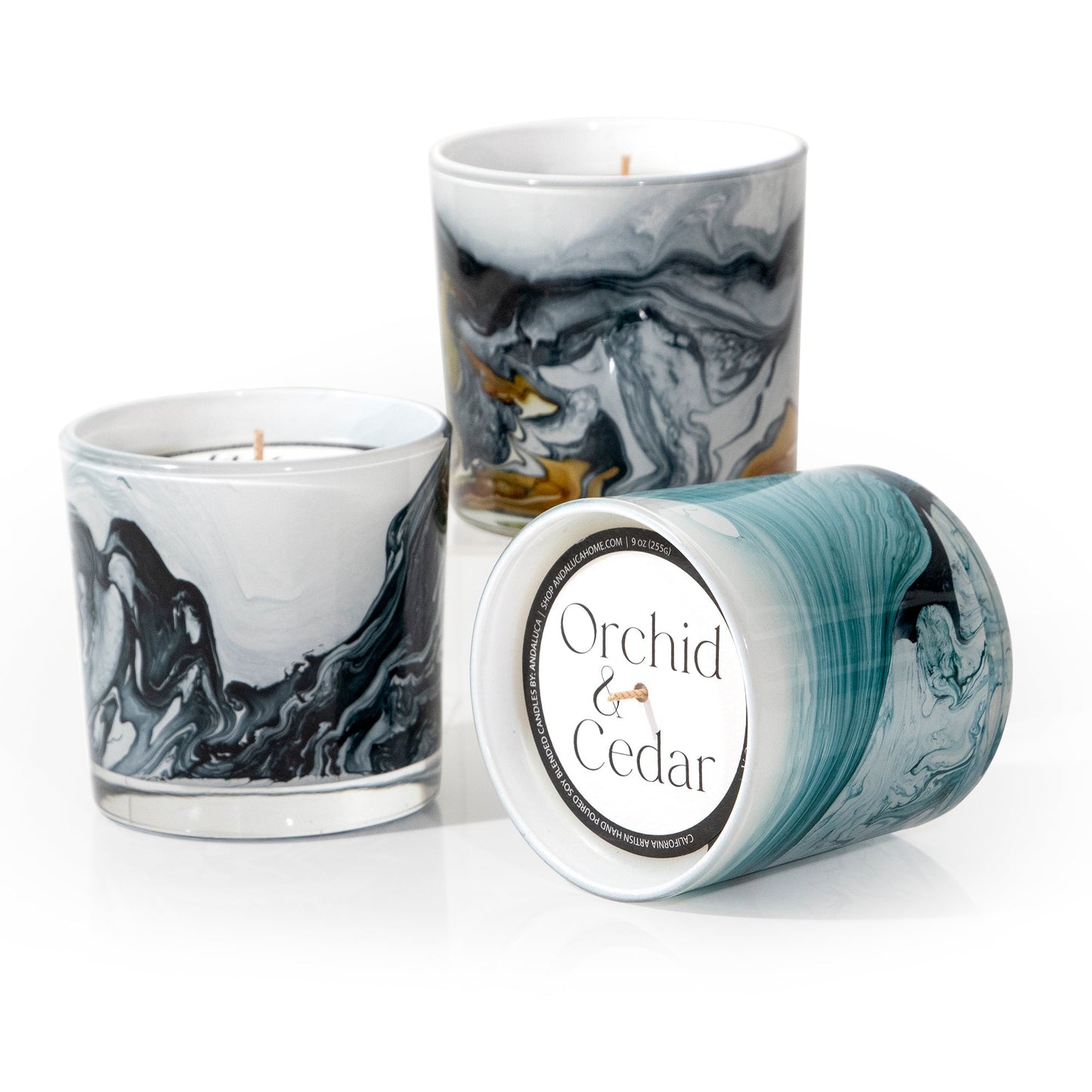 Orchid & Cedar 9 oz. Swirl Glass Candle by Andaluca Home