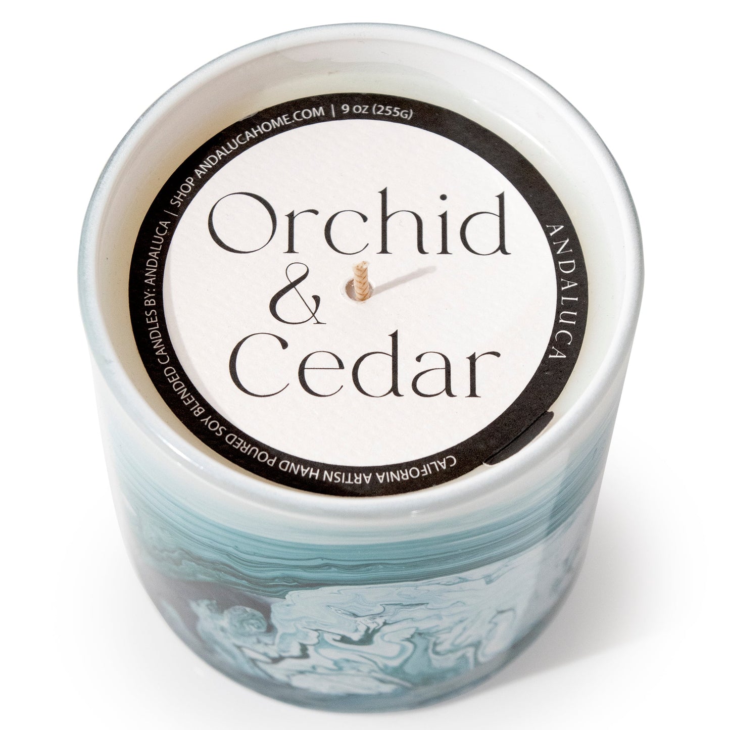 Orchid & Cedar 9 oz. Swirl Glass Candle by Andaluca Home